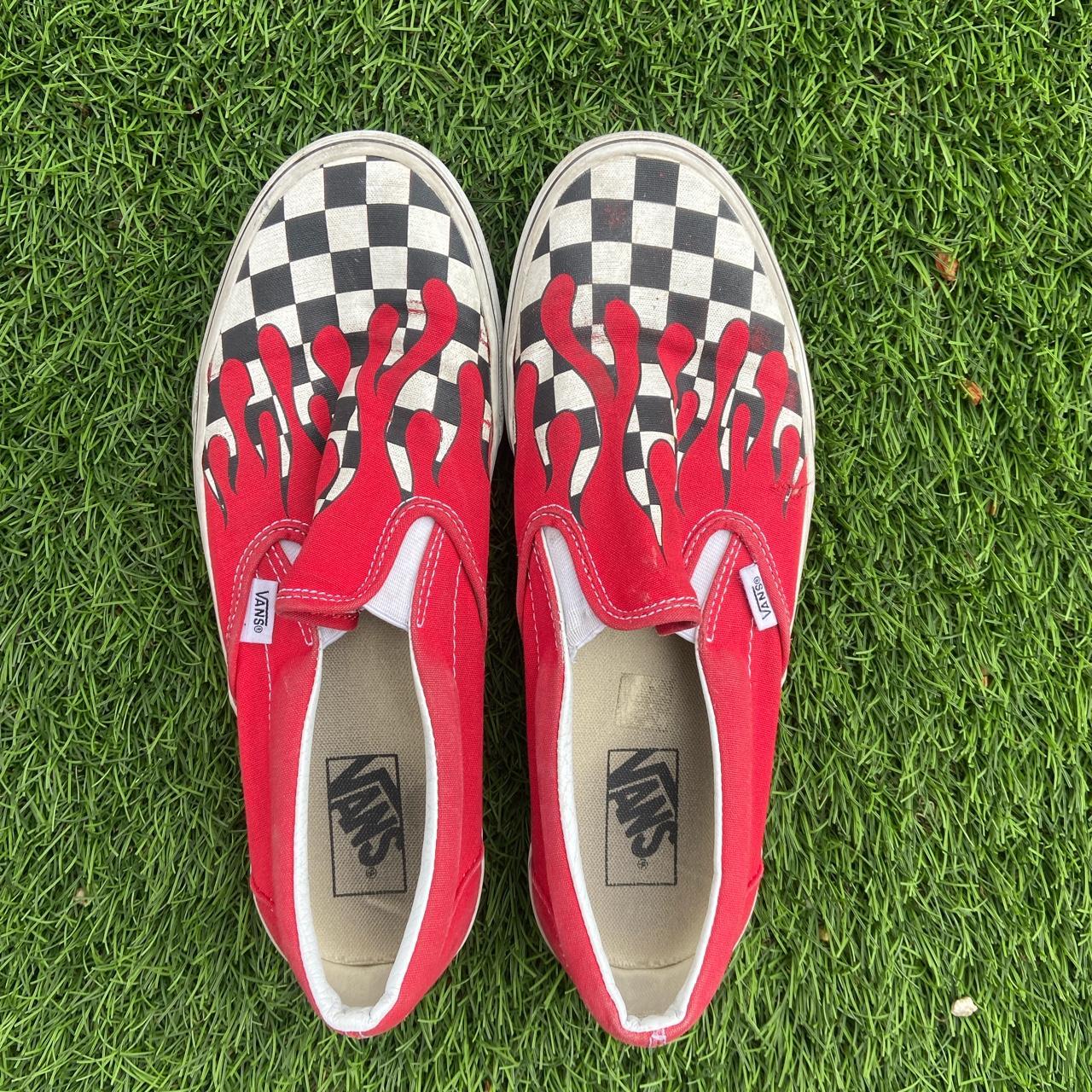 Checkered vans store with red flames