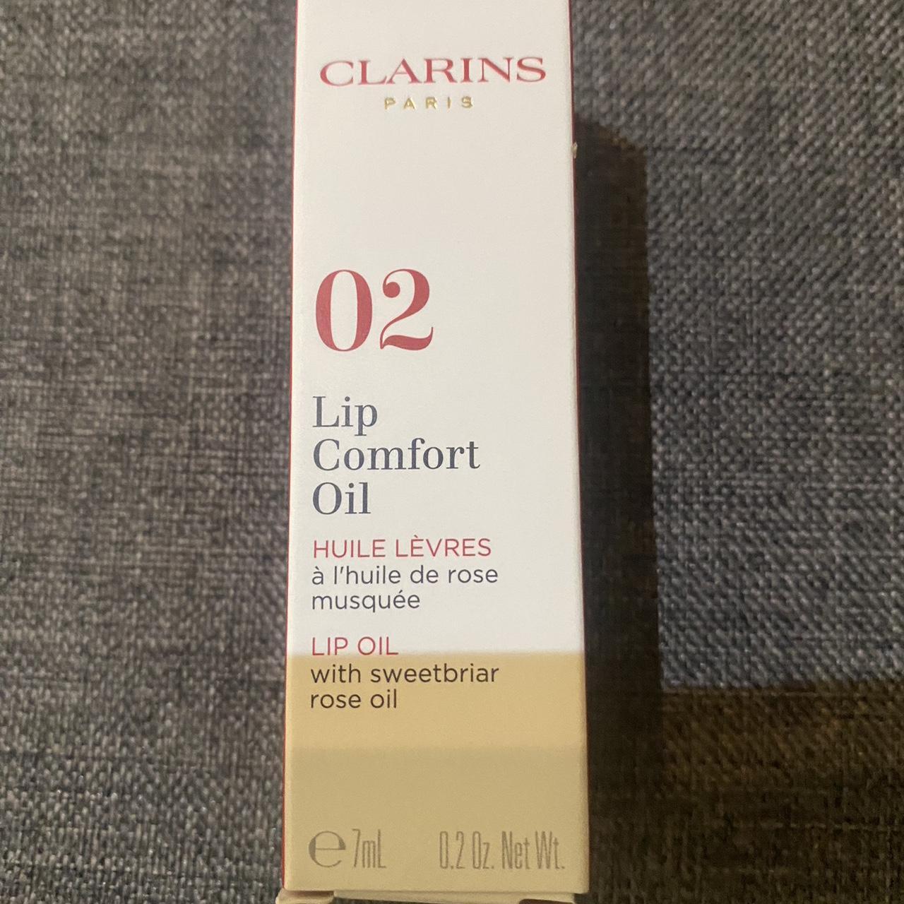 Clarins Lip oil In shade 02 Raspberry Never been... - Depop