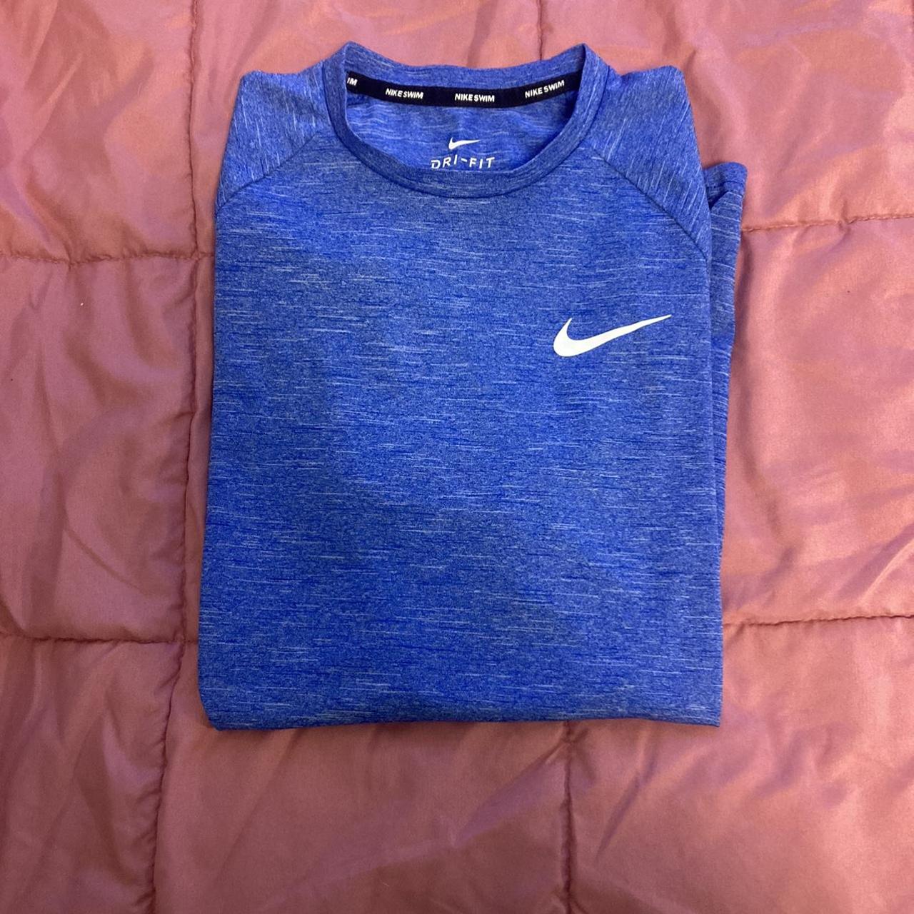 blue and white nike shirt womens