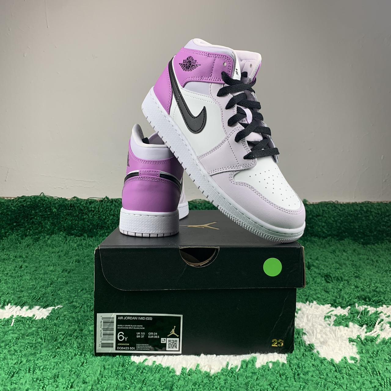 Air Jordan 1 Mid GS Barely Grape in a Grade School...