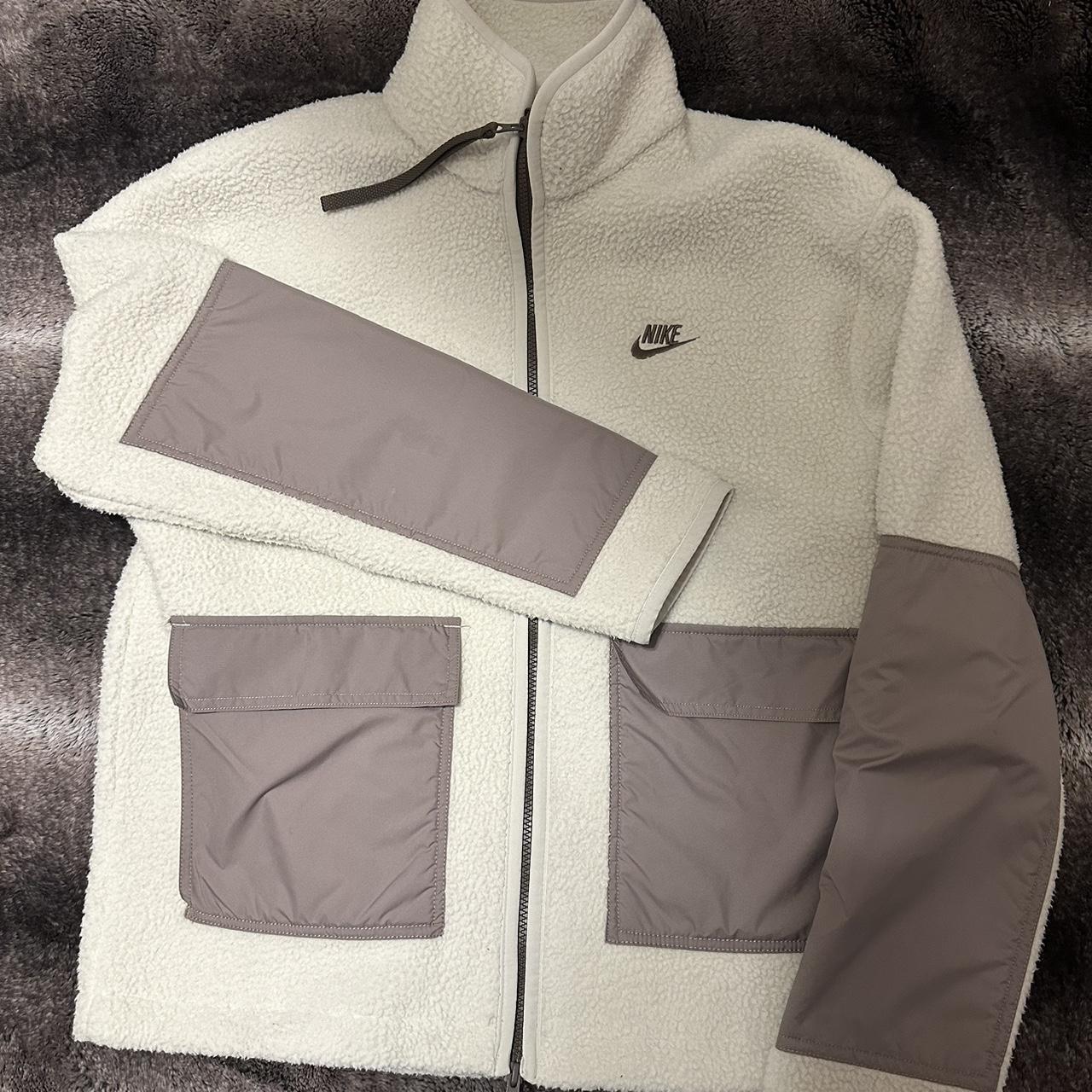cream and black nike