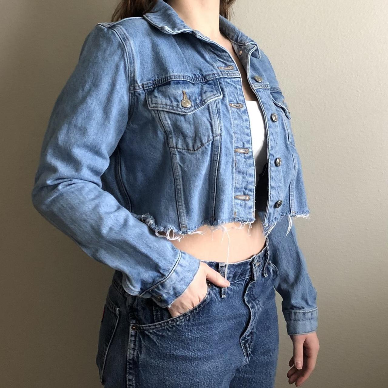 distressed cropped jean jacket womens s/m, model is... Depop