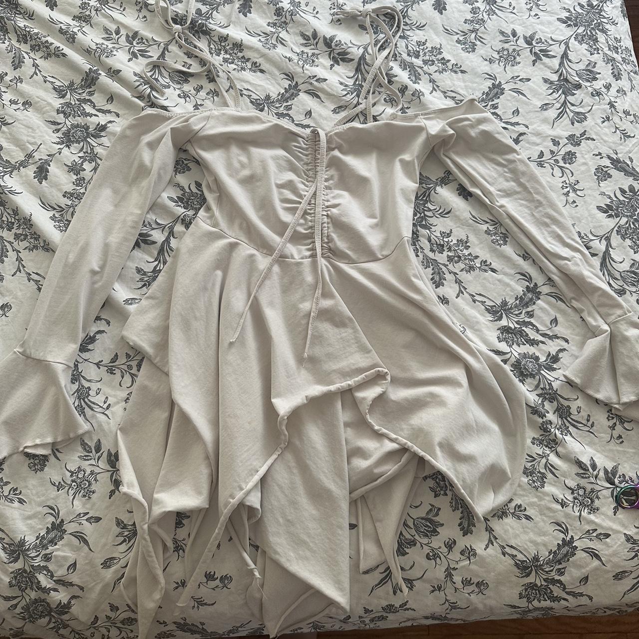 Dolls kill fairies hankerchief pixie dress in cream.... Depop