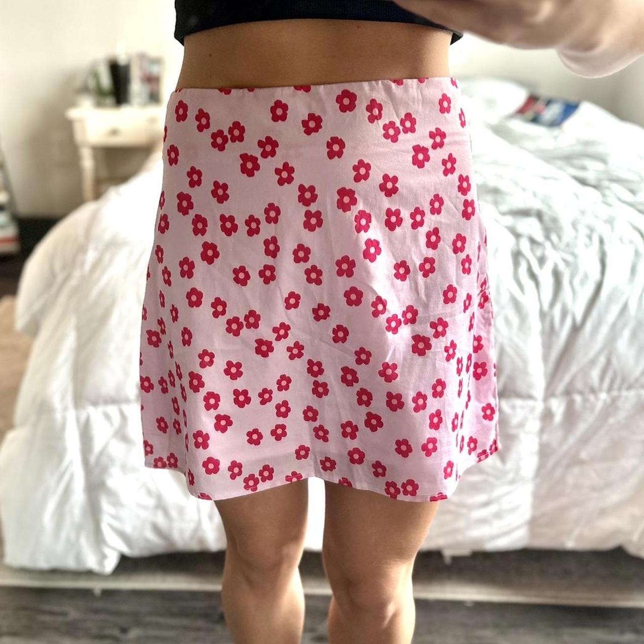 Pink mini skirt with red flowers best sale