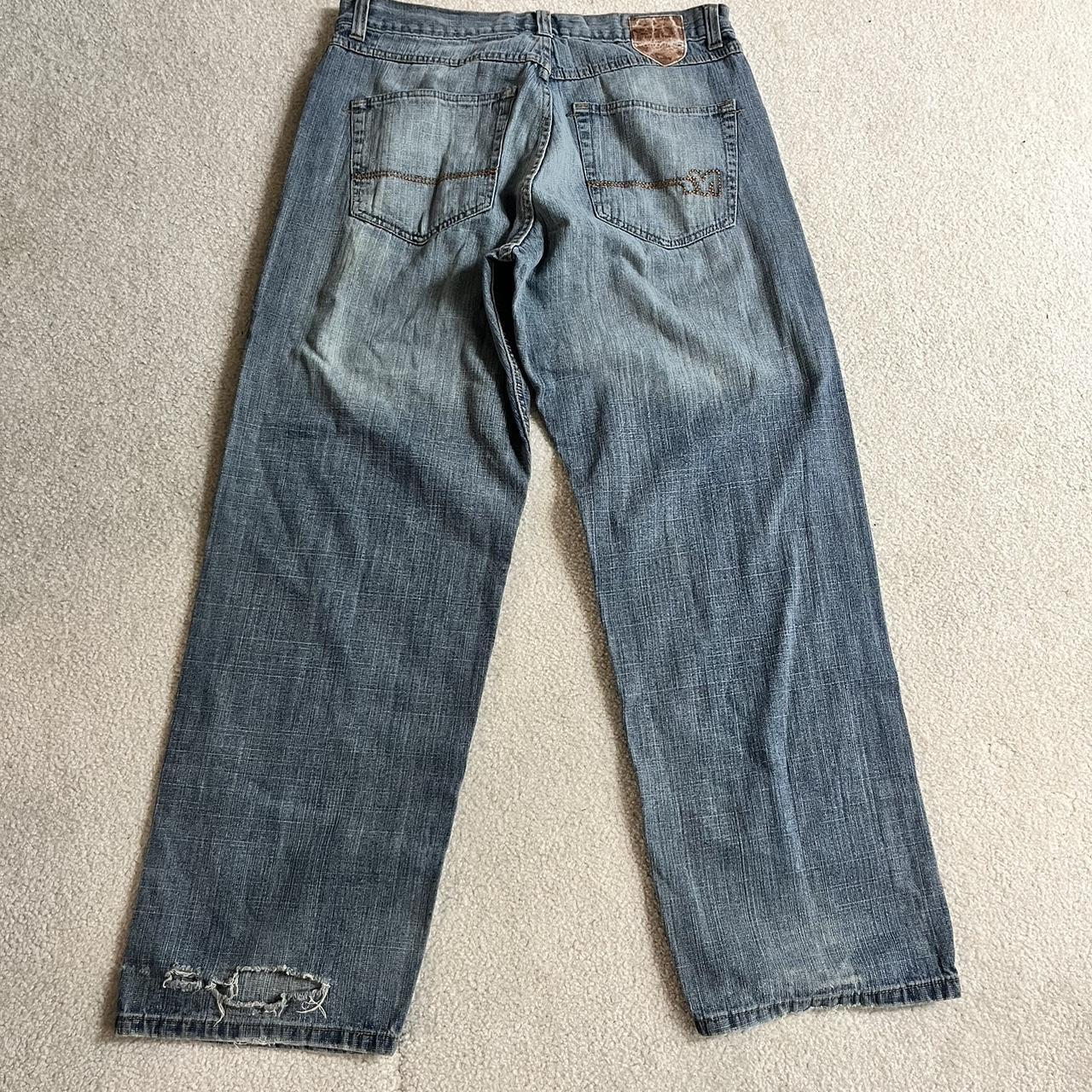 Mecca Jeans 36/34 Baggy Distressing on front right... - Depop