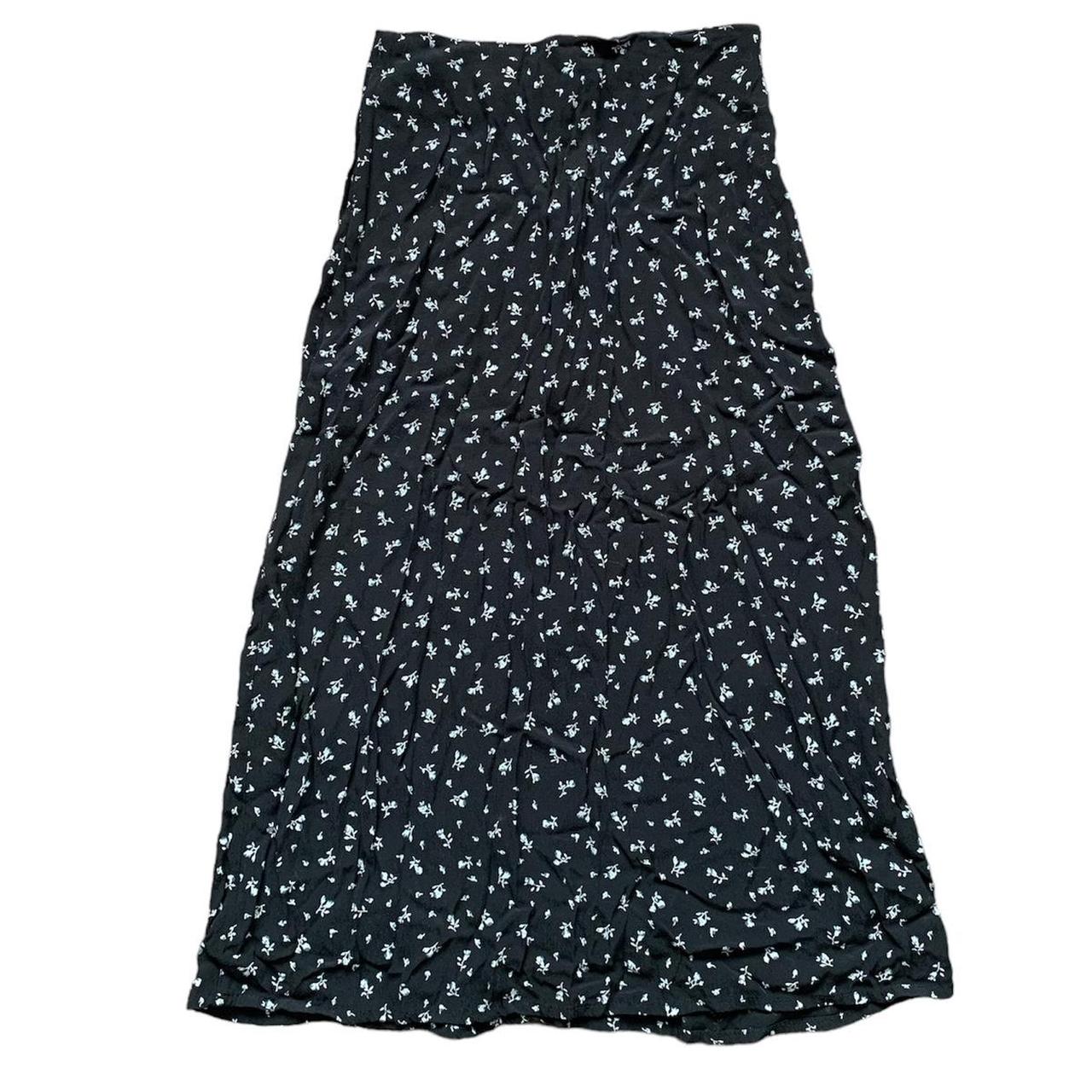 Brandy Melville midi skirt. Black with white floral.... - Depop