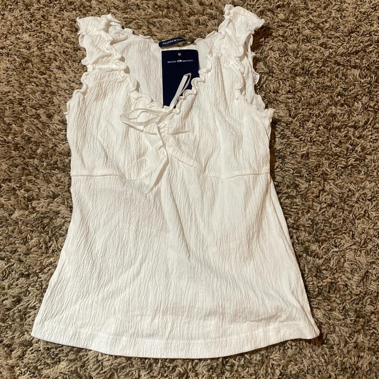 Brandy Melville white ruffle top with ribbon... Depop
