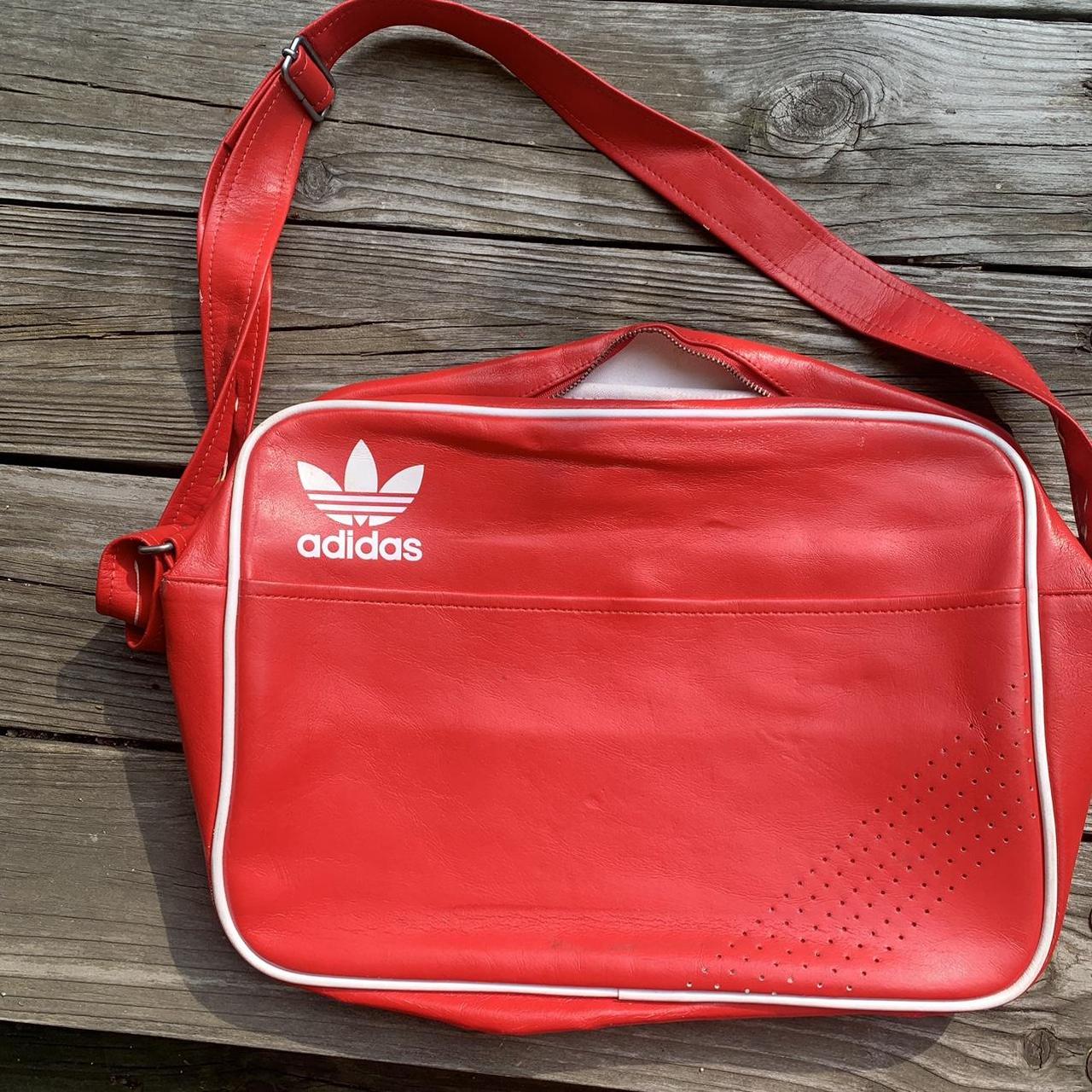 Y2K era Adidas airliner bag. The bag is bright red... - Depop