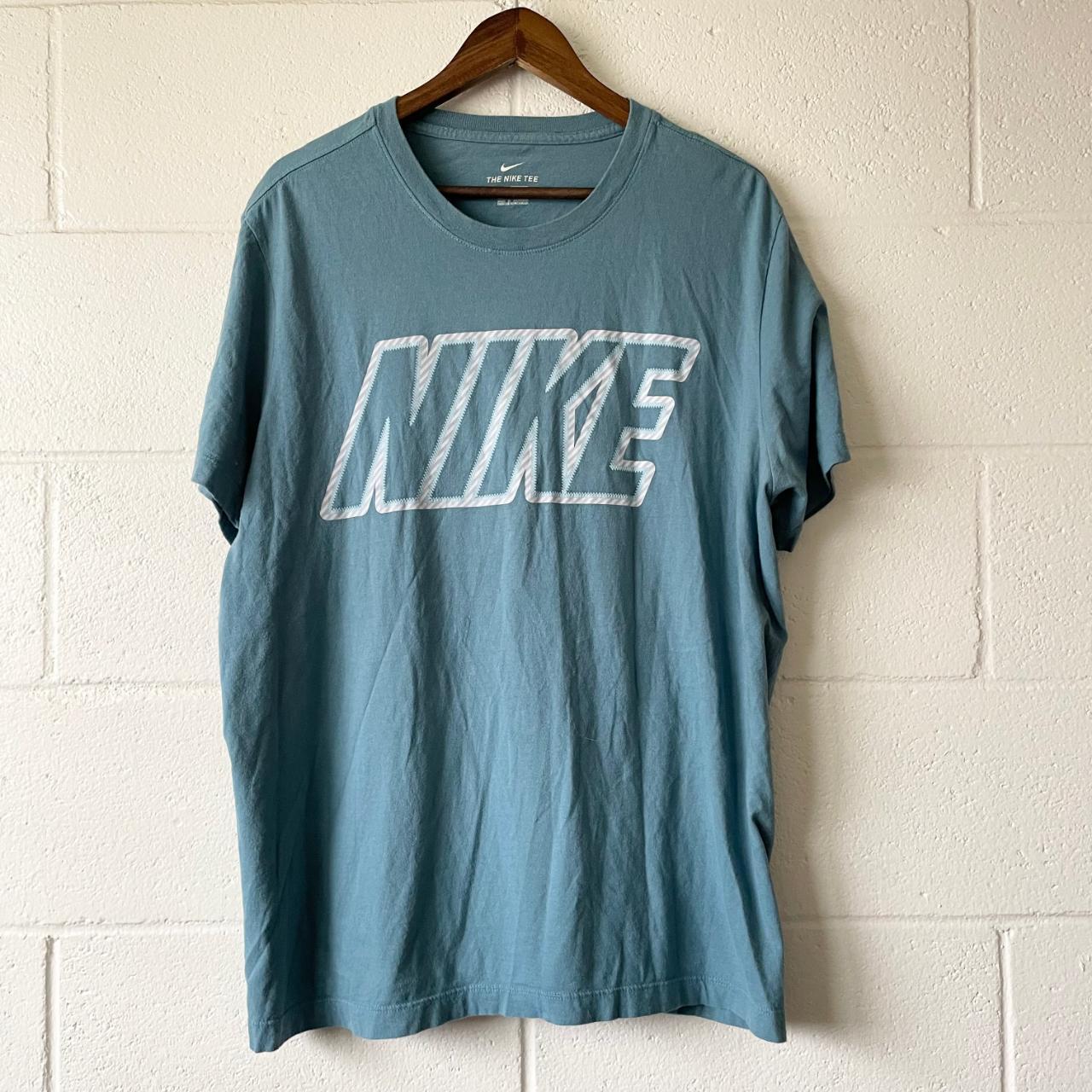 - Nike Blue The Nike Tee Striped Short Sleeve... - Depop