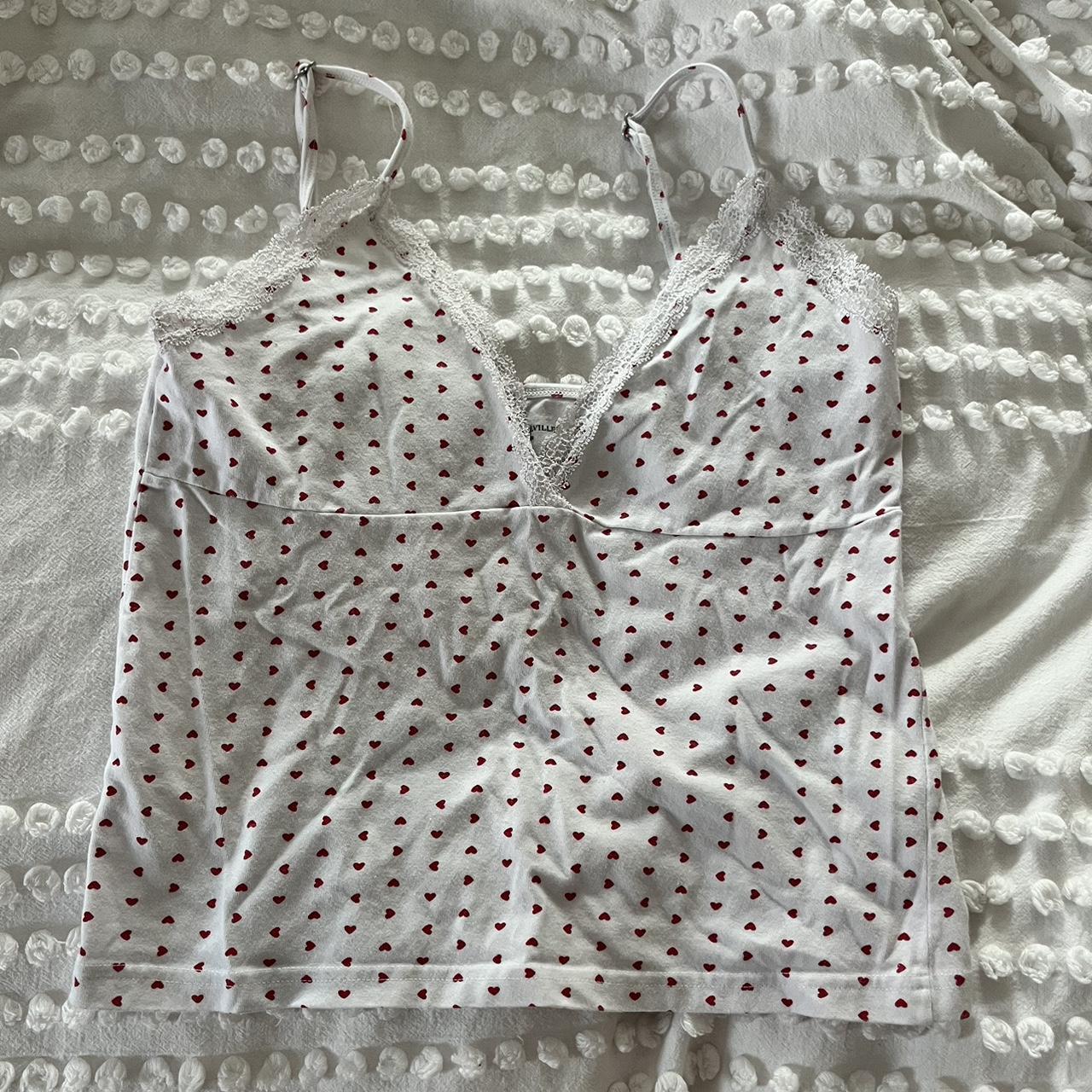 Brandy Melville heart tank Worn a couple of times,... Depop