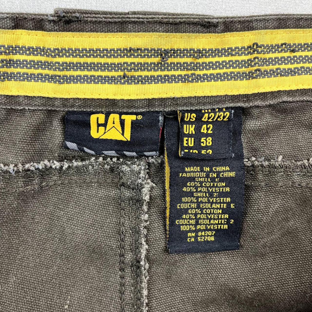 Caterpillar Men's Brown and Black Trousers Depop