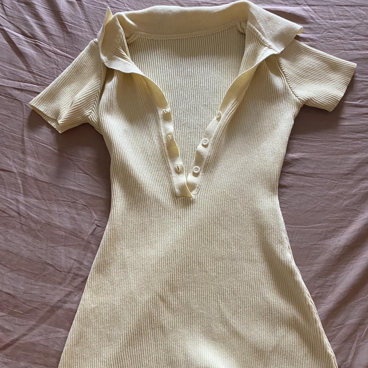 Pastel yellow romper! Perfect for beach days and... Depop