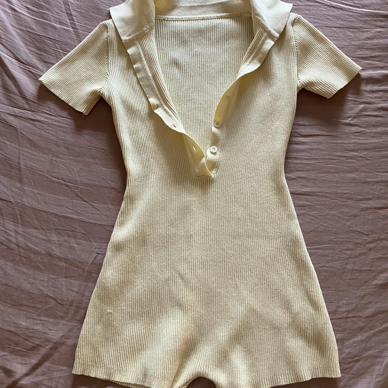 Pastel yellow romper! Perfect for beach days and... Depop