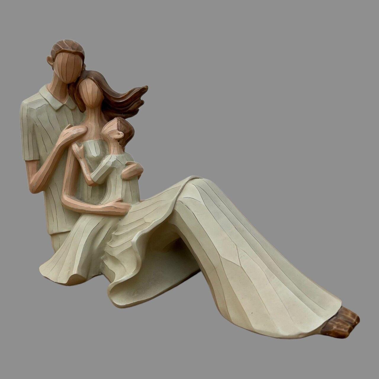 The Leonardo COLLECTION Family Embrace. Parent and... Depop