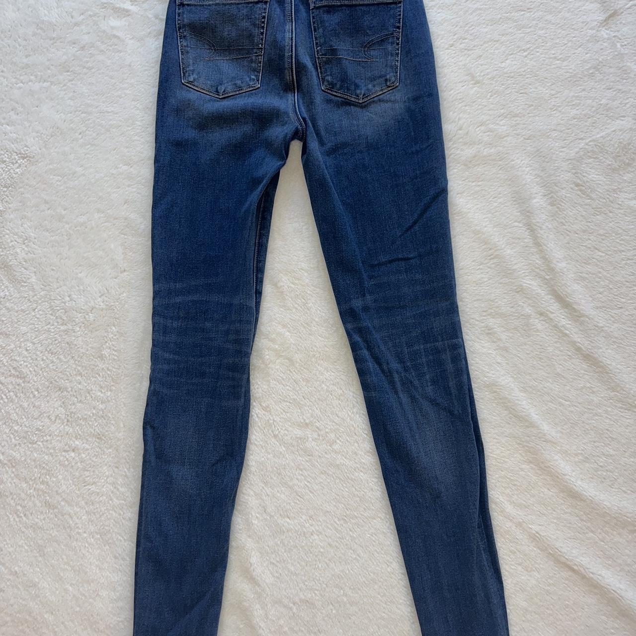 american eagle skinny jeans dark wash small snags on - Depop