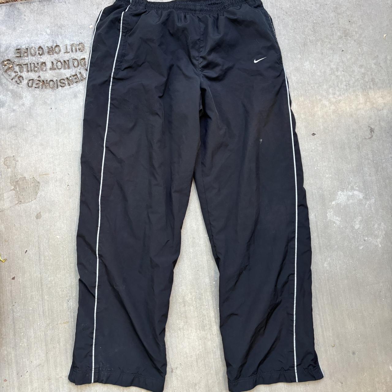 Vintage nike parachute pants Black Some small... - Depop