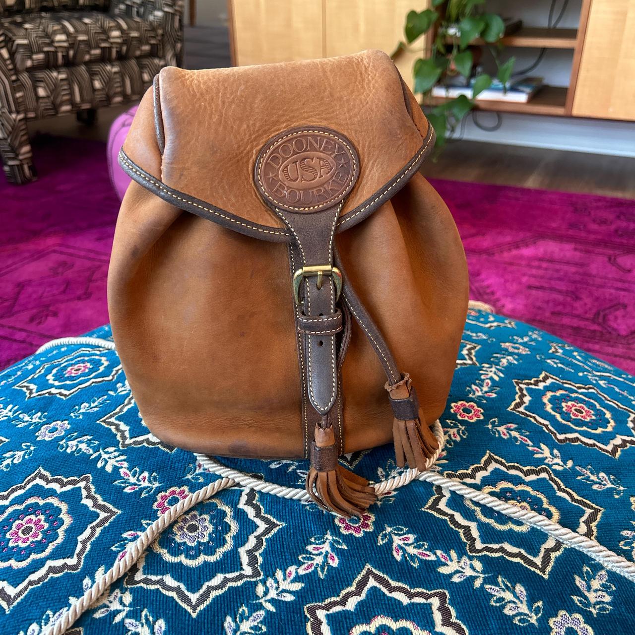 Vintage Dooney and Bourke leather backpack. unlined. Depop