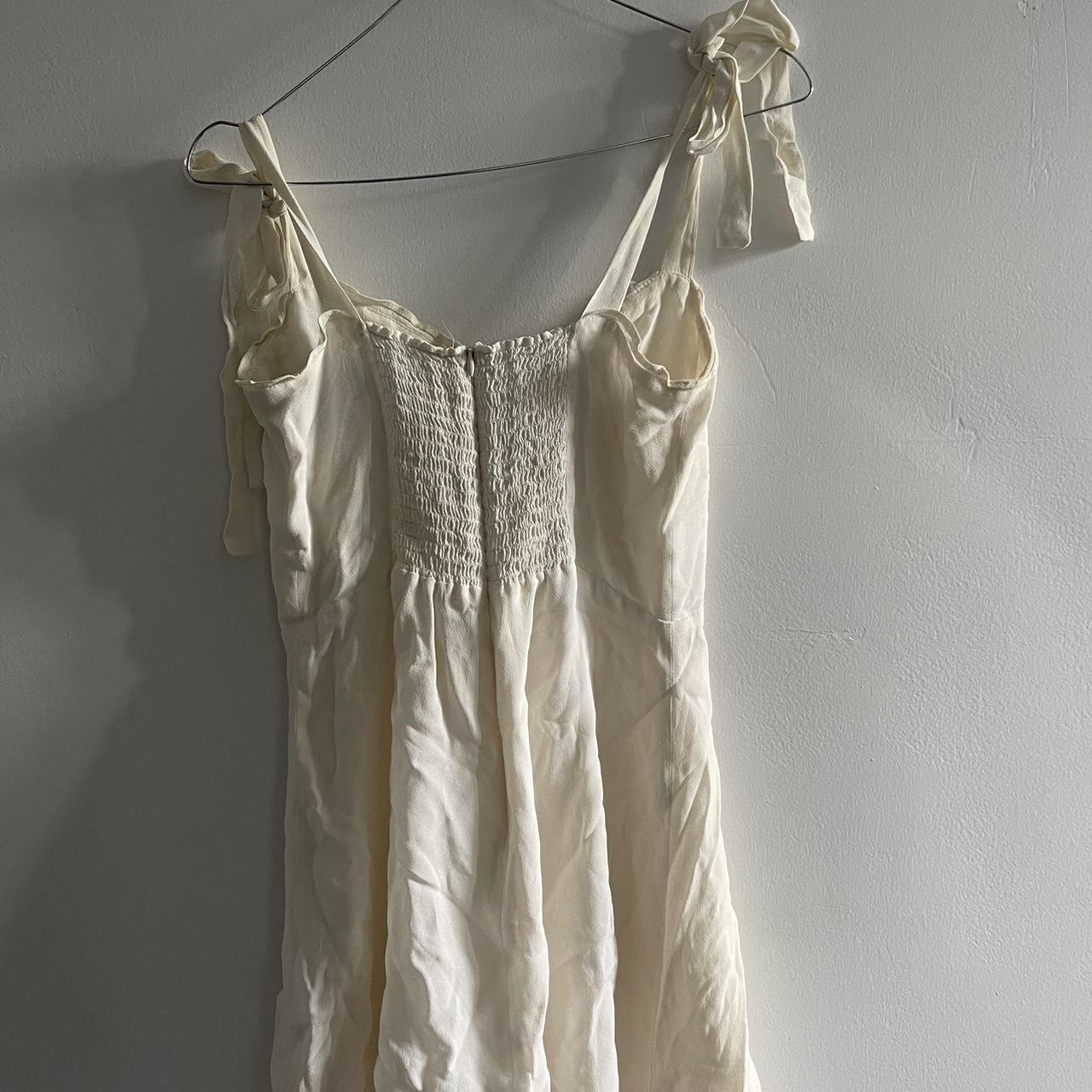 White reformation dress slightly stained - Depop