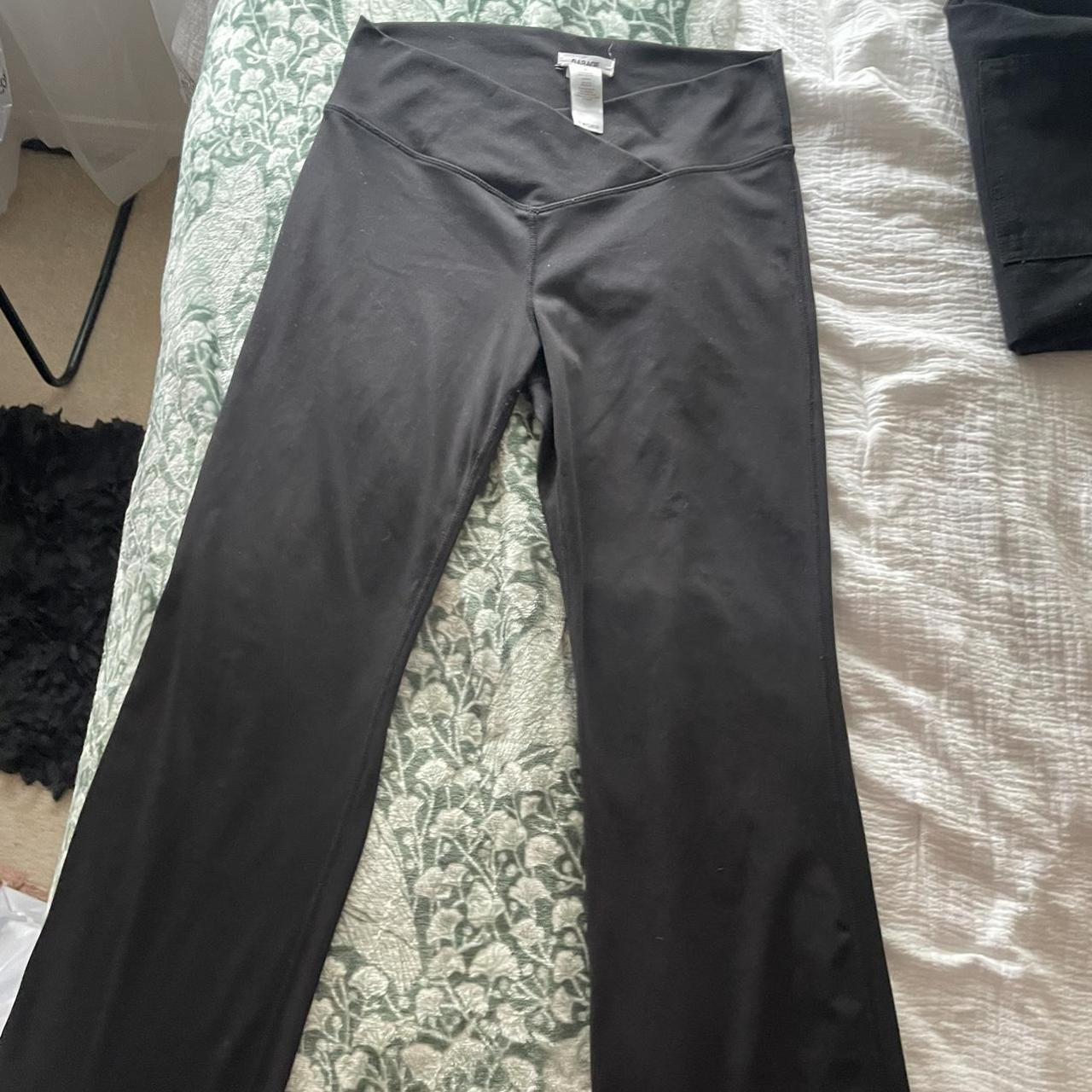 Garage Flared black cross over leggings! So so cute... Depop