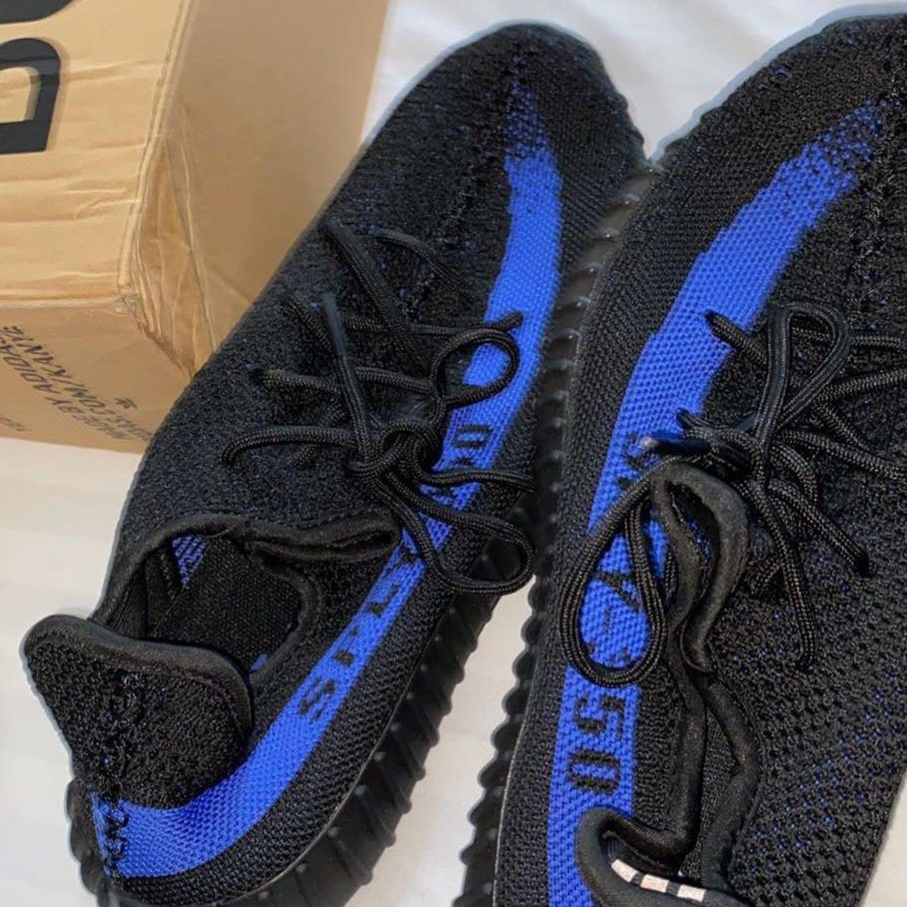 Yeezys 350 blue and black shoes size 7.5 - Depop