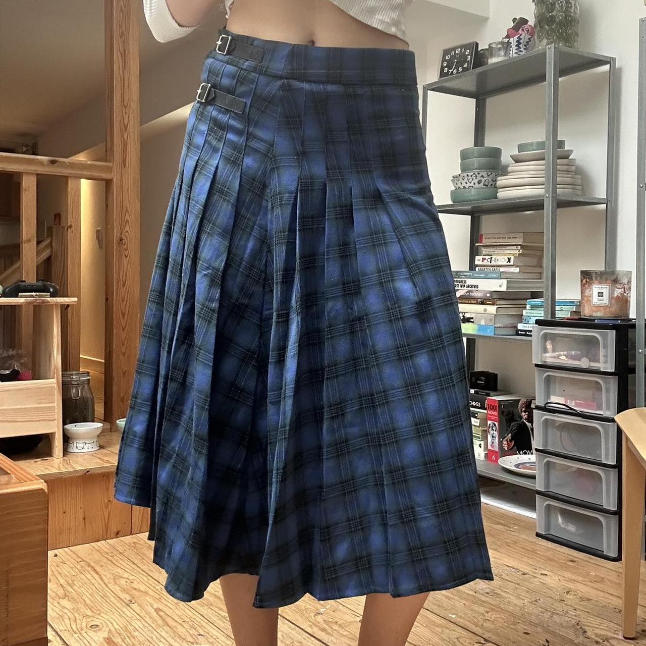 Blue and navy plaid pleated skirt with a zipper on. Depop