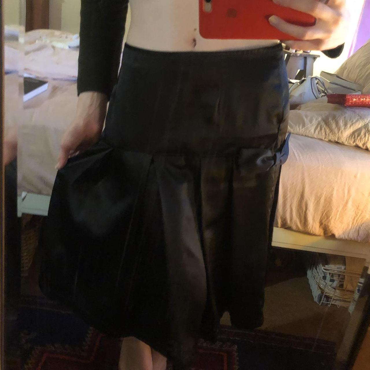 Satin pleated midi skirt with bow detail on the hip,... - Depop