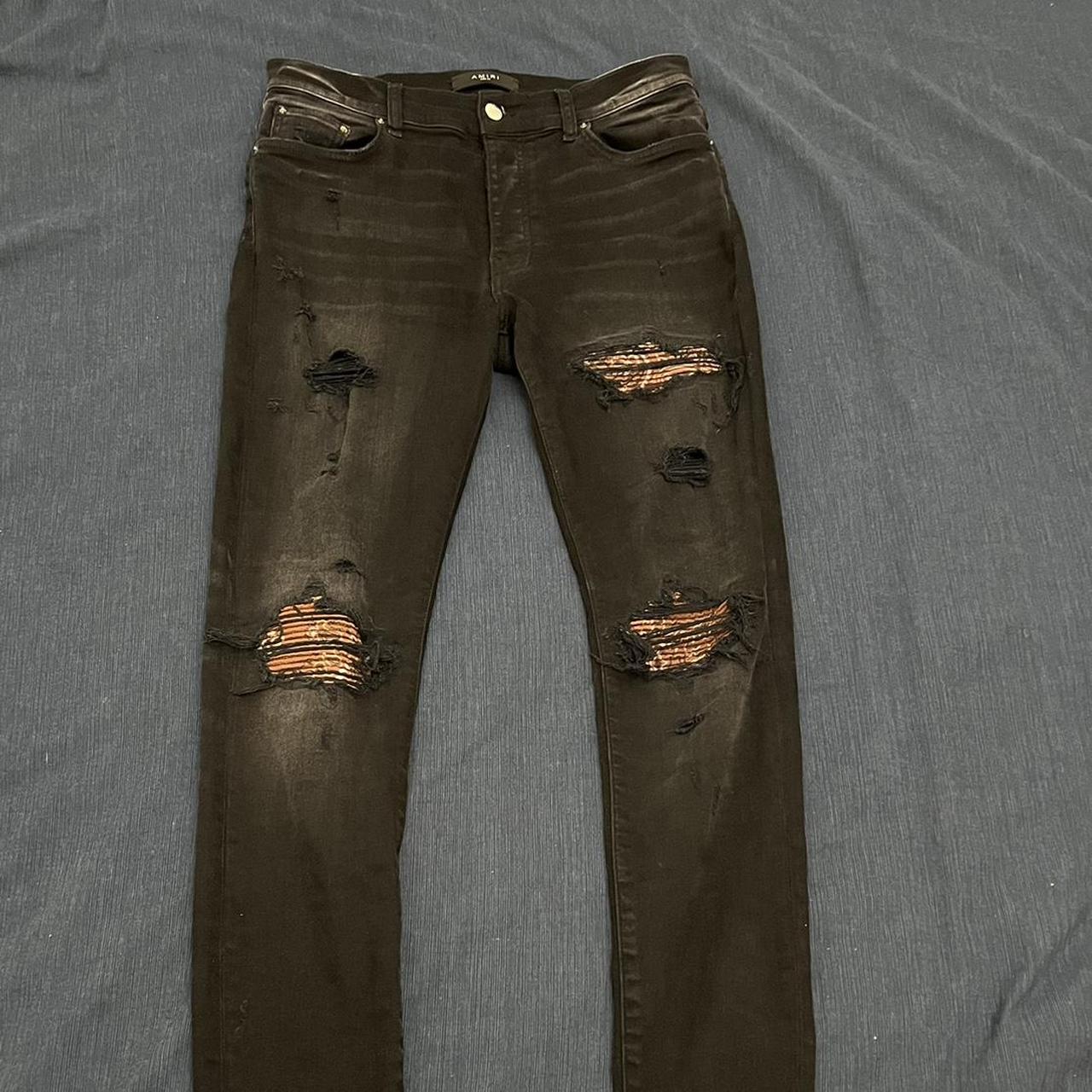 Amiri MX1 Bandana Jeans with Ripped Design