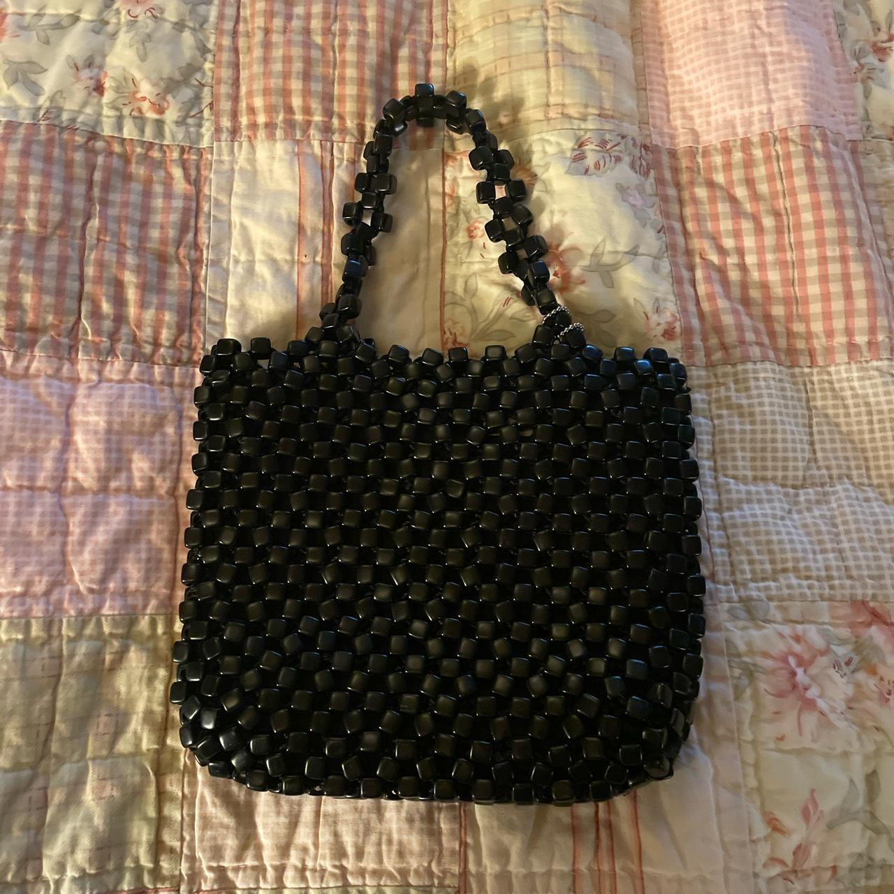 The Sak brand beaded black hand bag Super trendy and