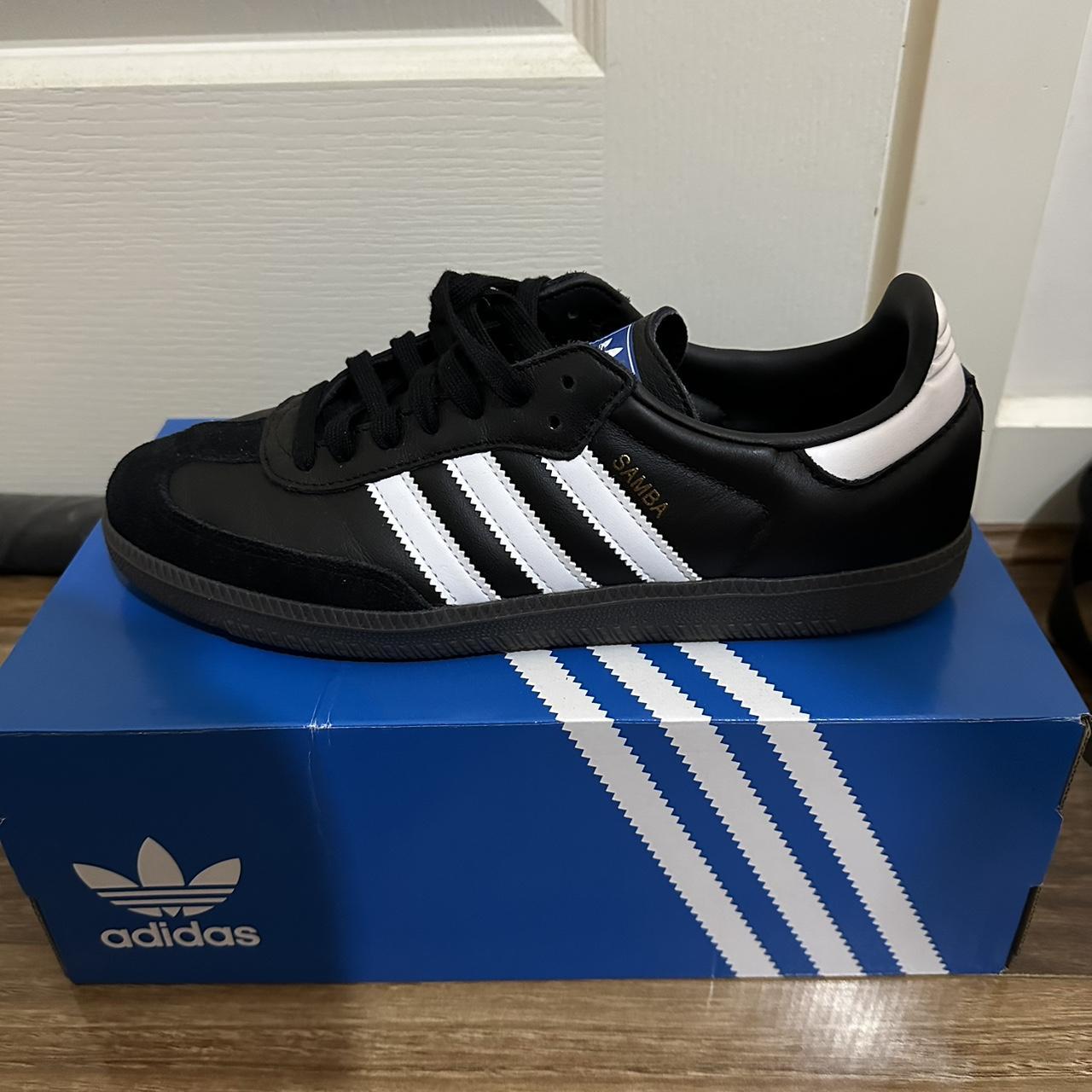 selling super popular black sambas with brown gums,... - Depop