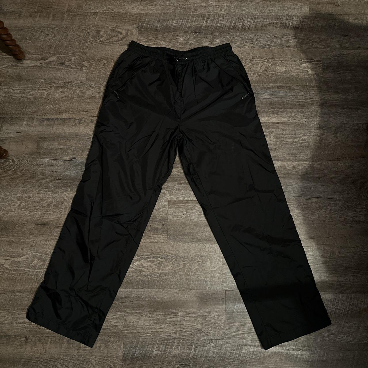 Baggy black nylon pants. These fit pretty wide but... - Depop