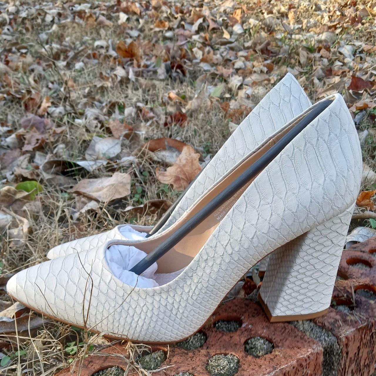 White sales snakeskin pumps