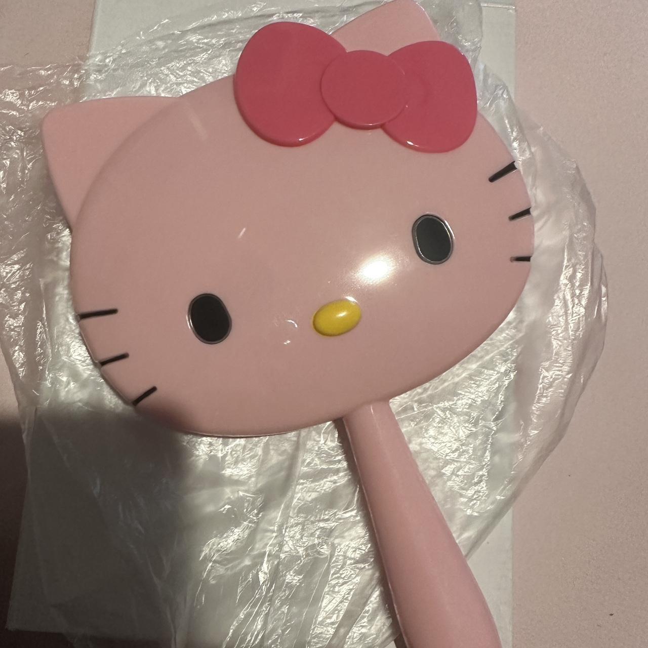 Hello Kitty hand held mirror Depop