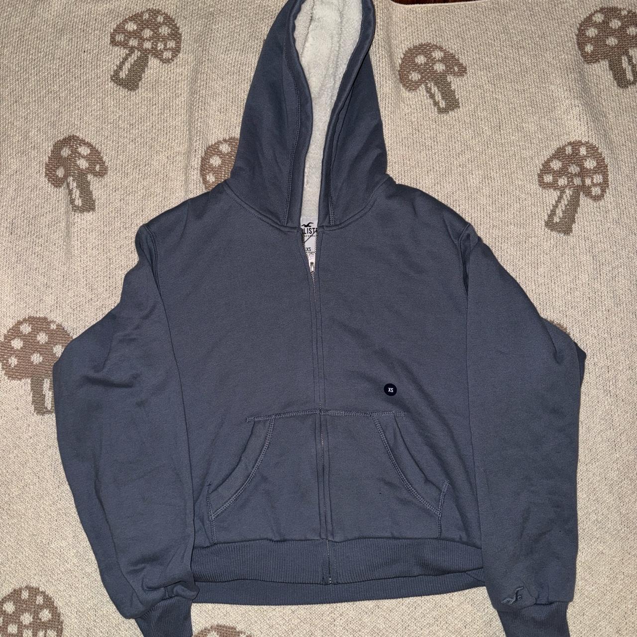 Hollister fuzzy zip up with front sticker on but not... - Depop