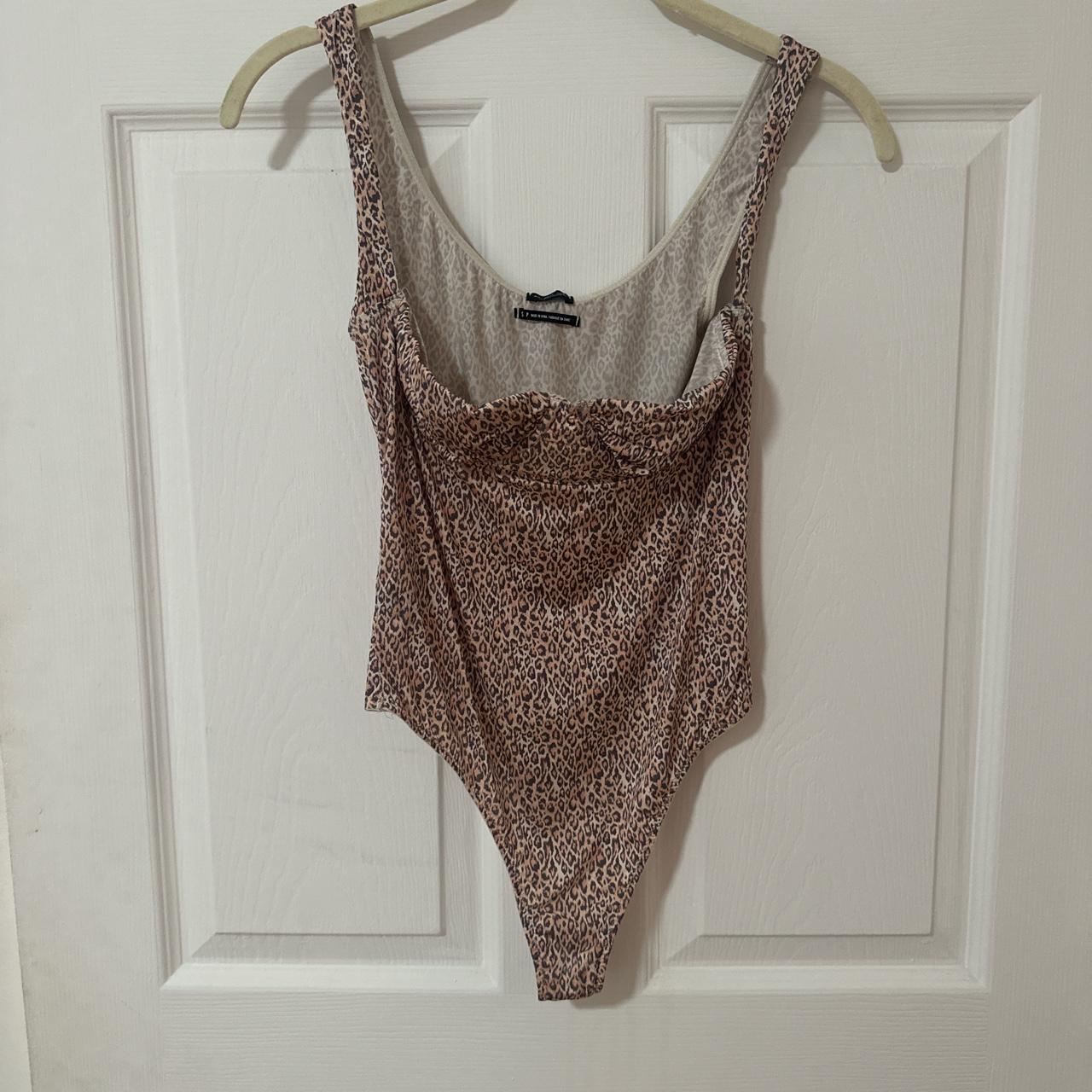 UO Out from Under Cheetah Bodysuit #urbanoutfitters... - Depop