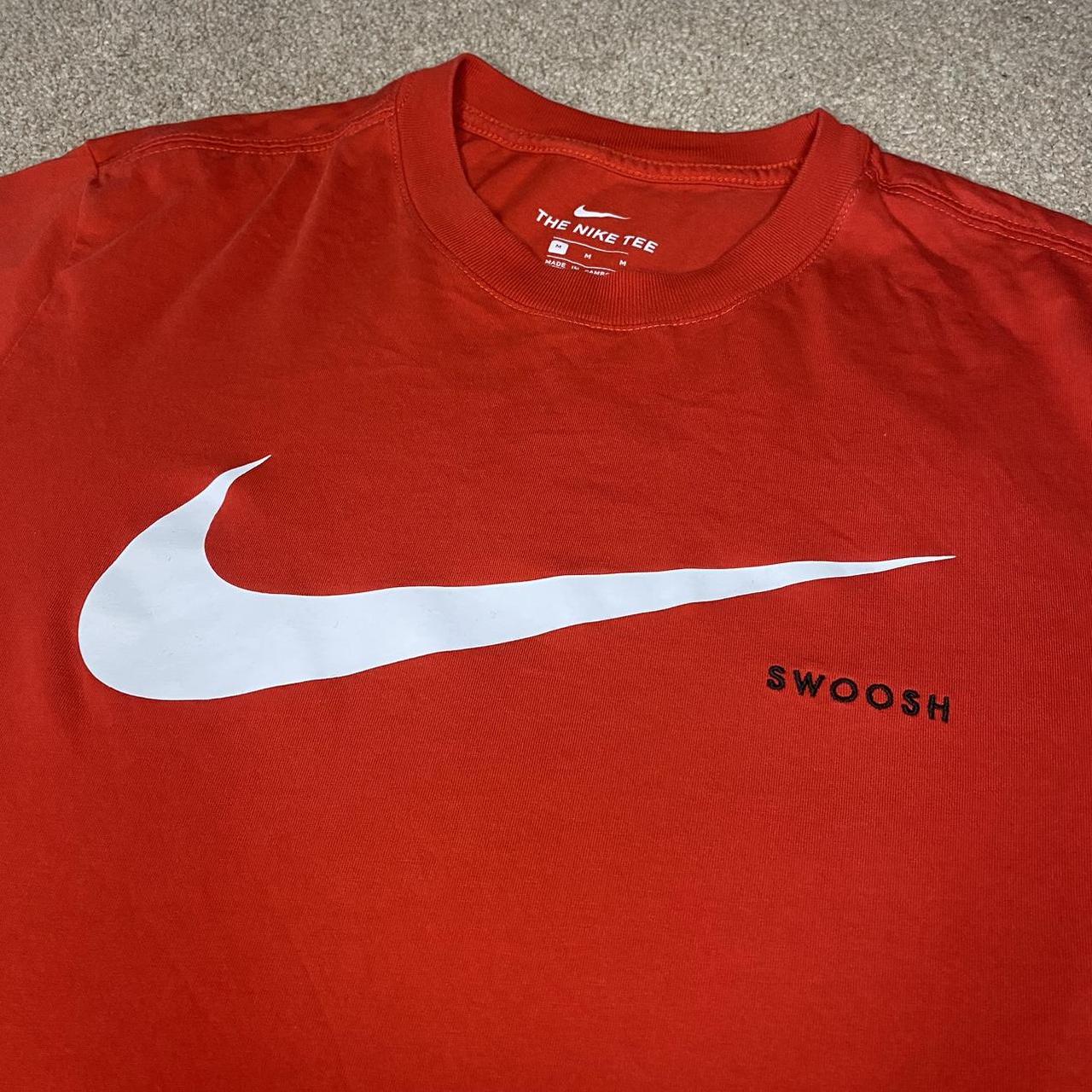 team red nike shirt