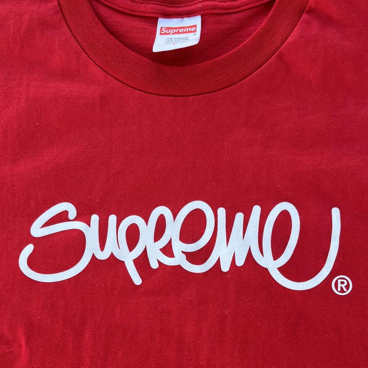 Red Supreme hand style logo spell out graphic tee... - Depop