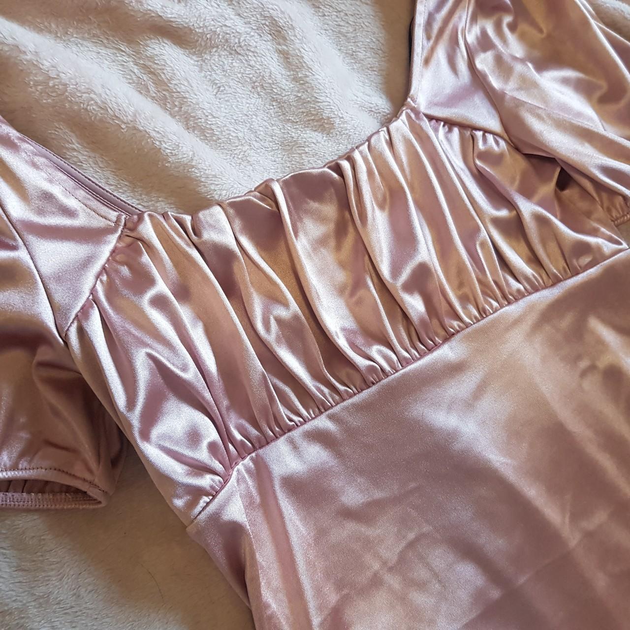 Medium satin-y stretch light pink dress. Mid thigh.... - Depop