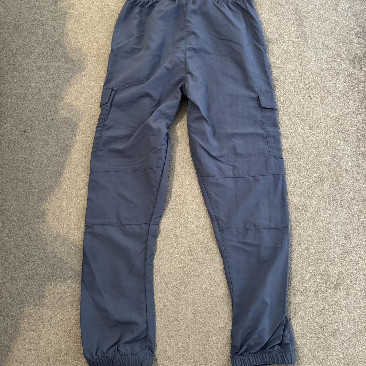 McKenzie cargo track pants. Grey. Medium - Depop