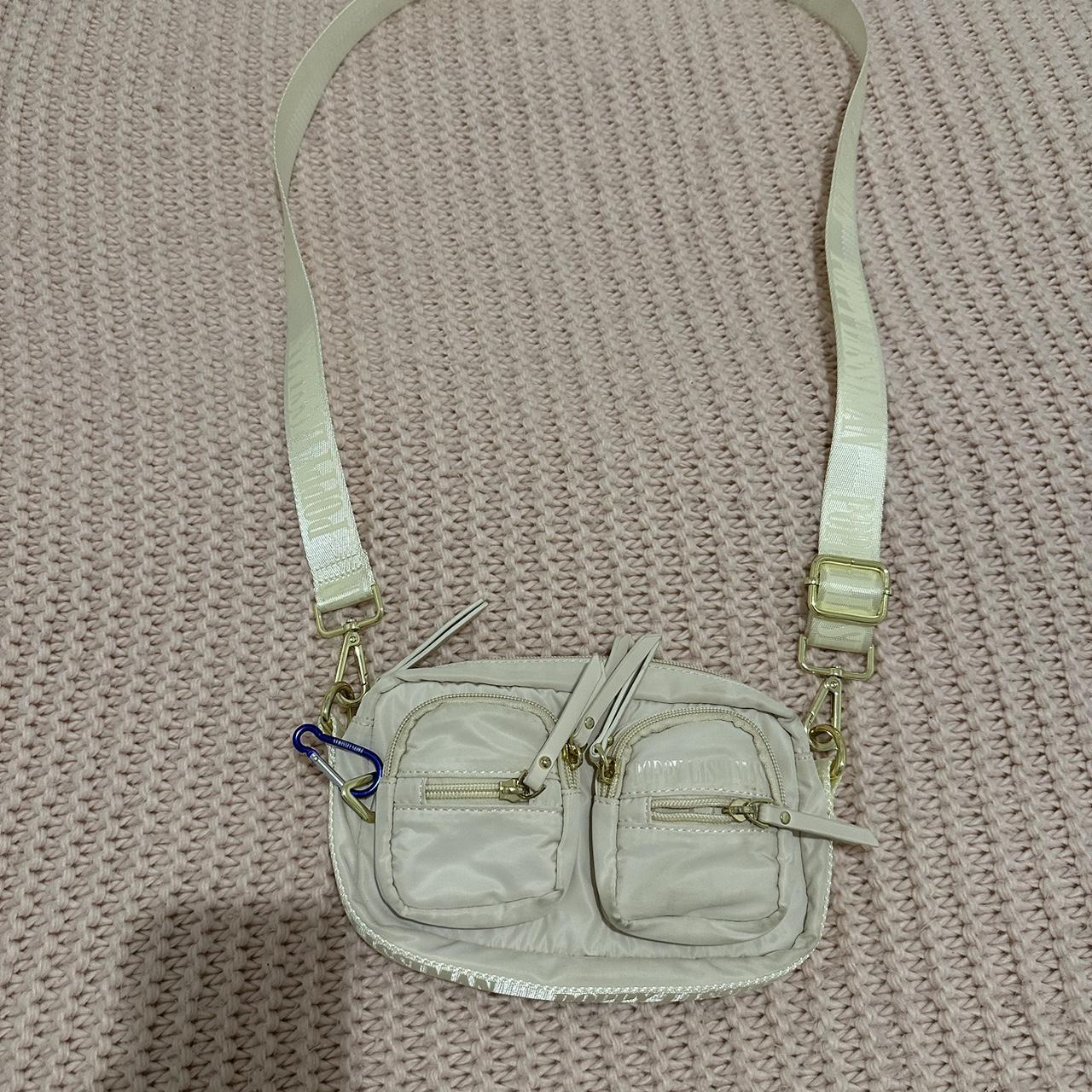 poppy lissiman bobby bag in the colour blanc, in... - Depop