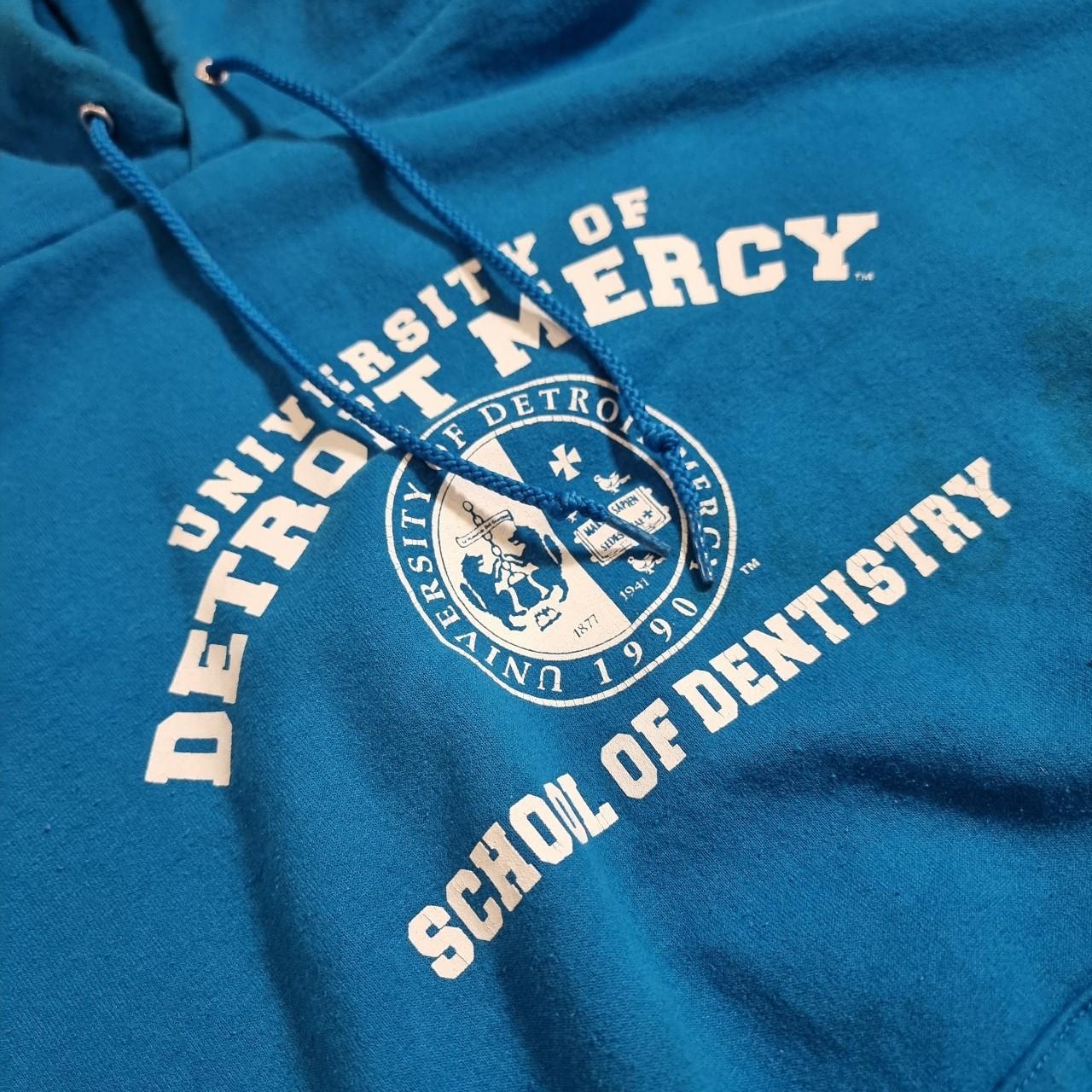 Champion Detroit Mercy Dentistry Blue Graffic Hoodie... Depop