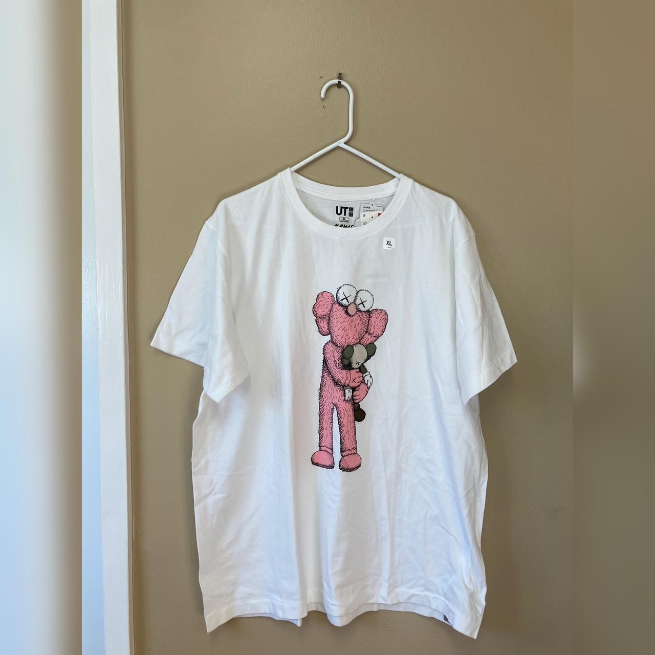 Pink kaws hot sale shirt