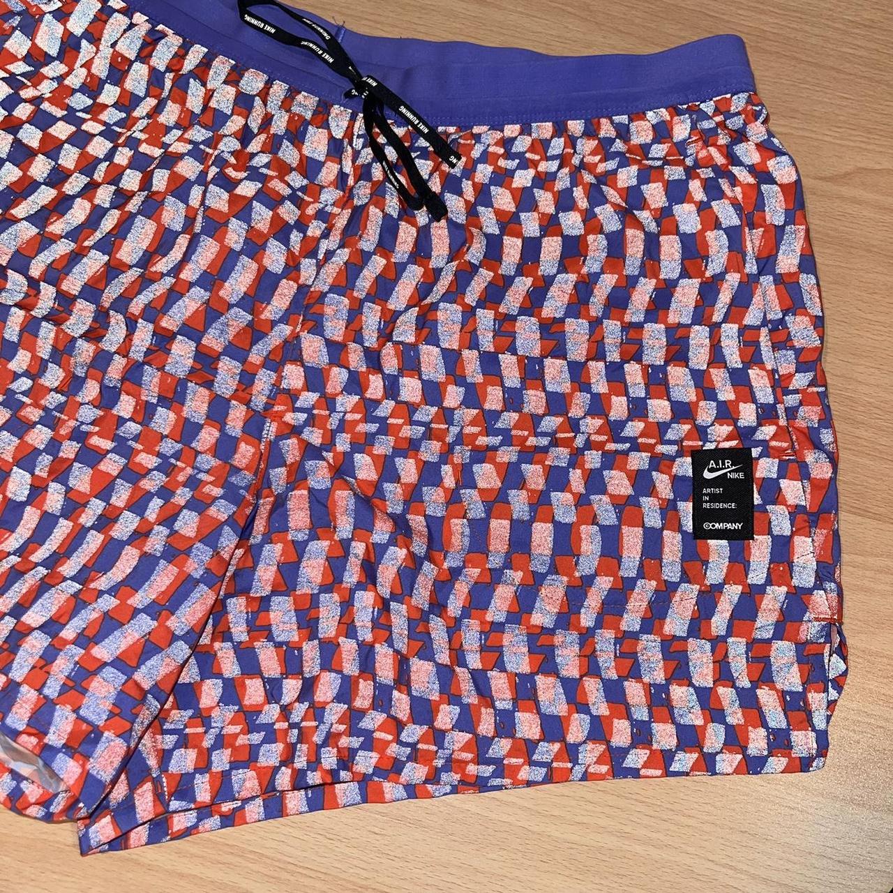 nike flex stride tokyo