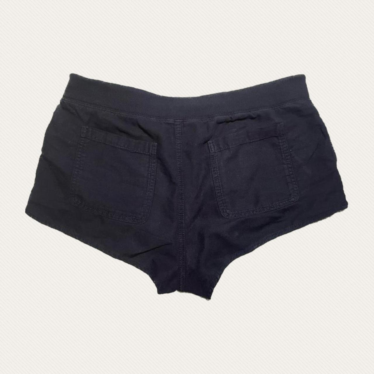 Aritzia Women's Black and Gold Shorts Depop