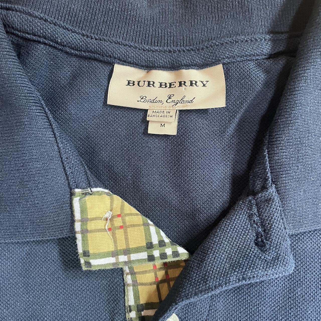 Classic Burberry dark navy polo shirt, size large , - Depop