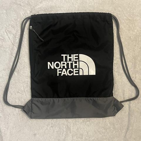 The north store face drawstring bag