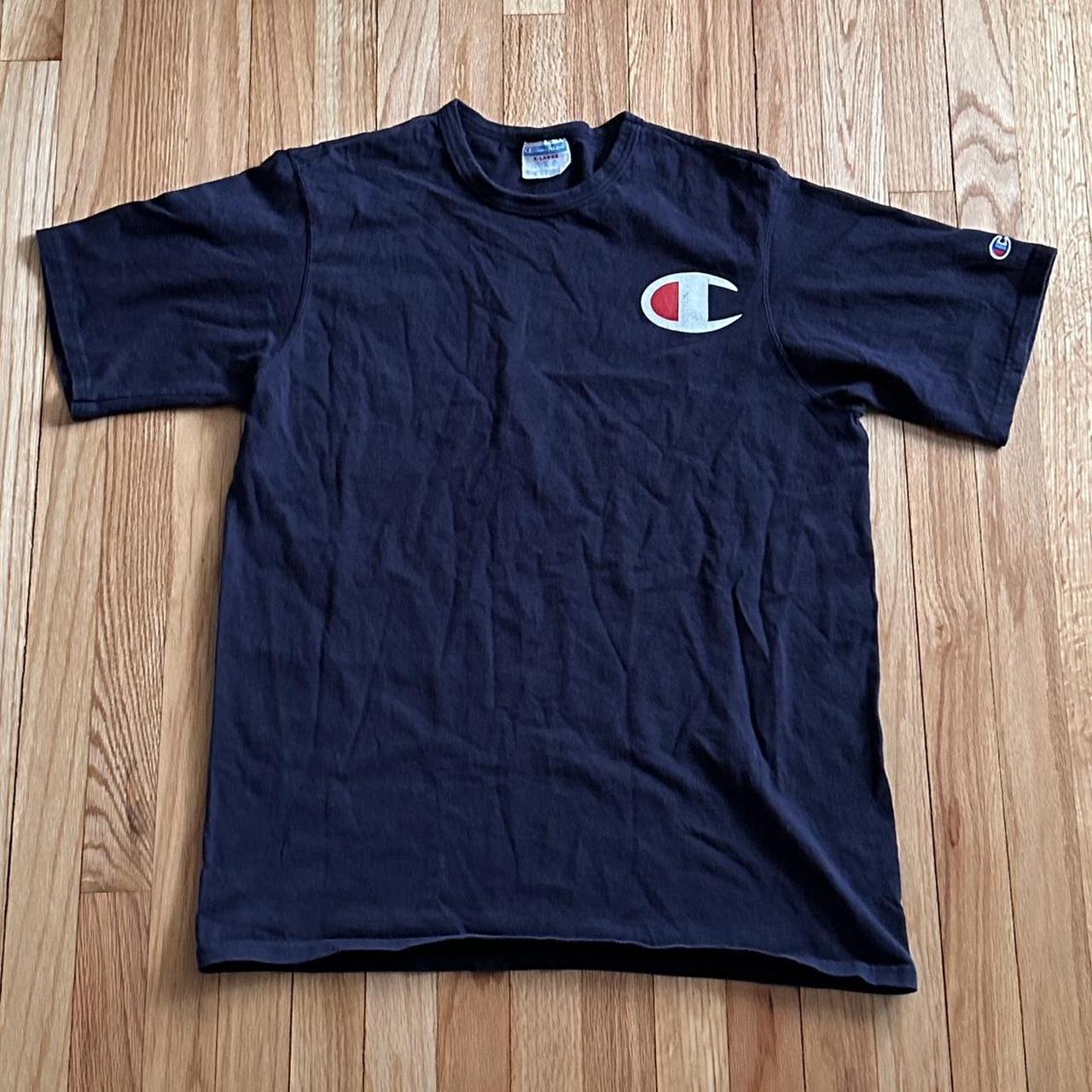 Champion Men's Blue T-shirt | Depop