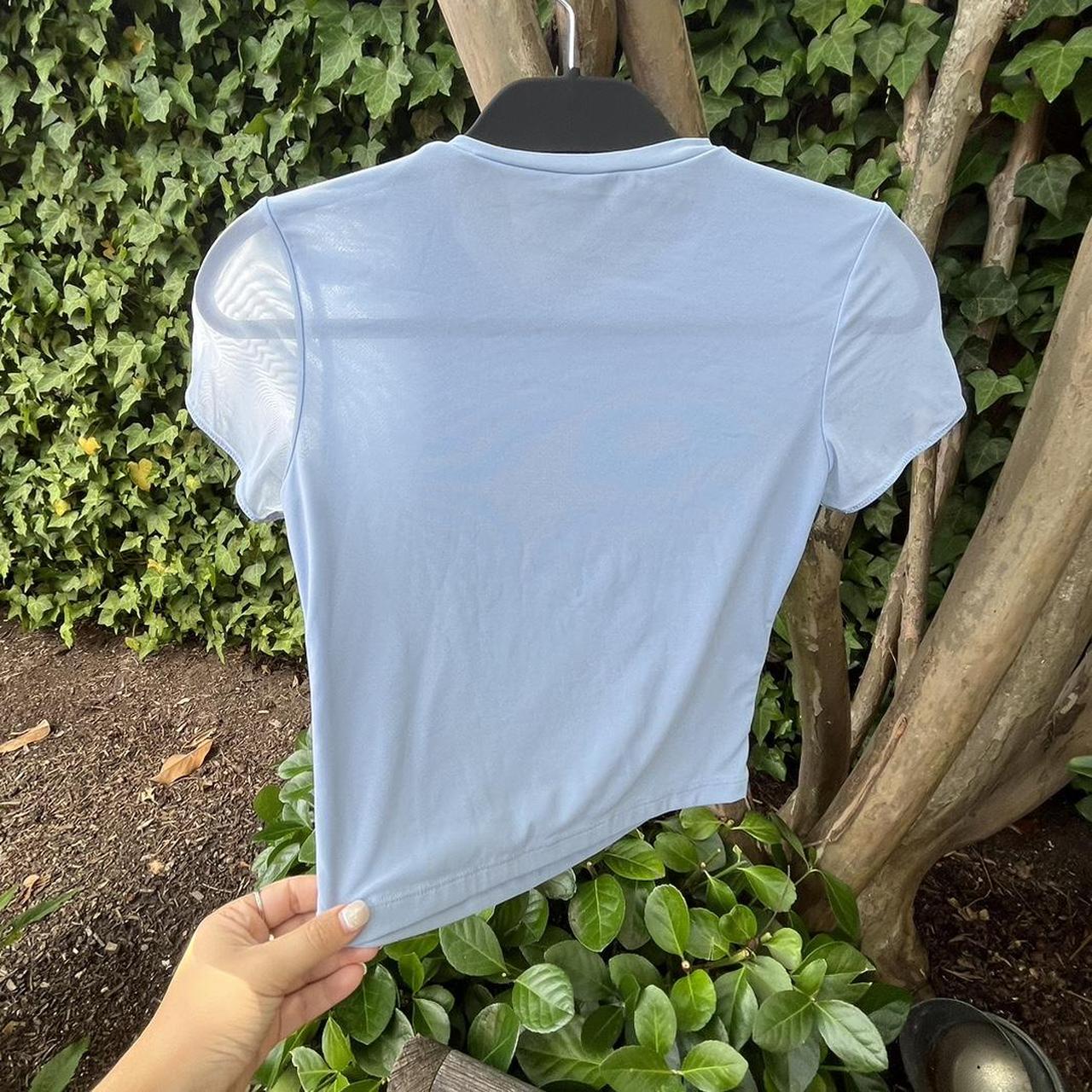 Adorable mesh baby blue baby tee from Parade. Nice... Depop