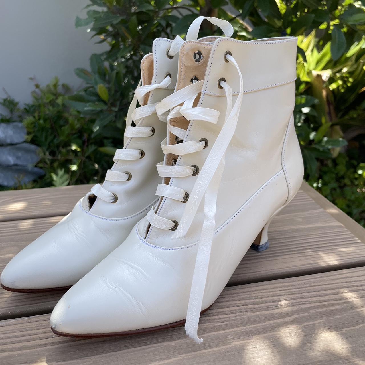 Ivory coloured boots with ribbon laces for a... Depop