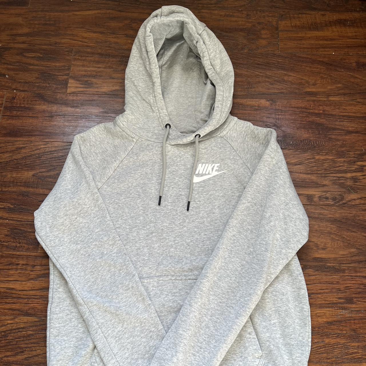 grey nike hoodie a little snug but cute with... - Depop