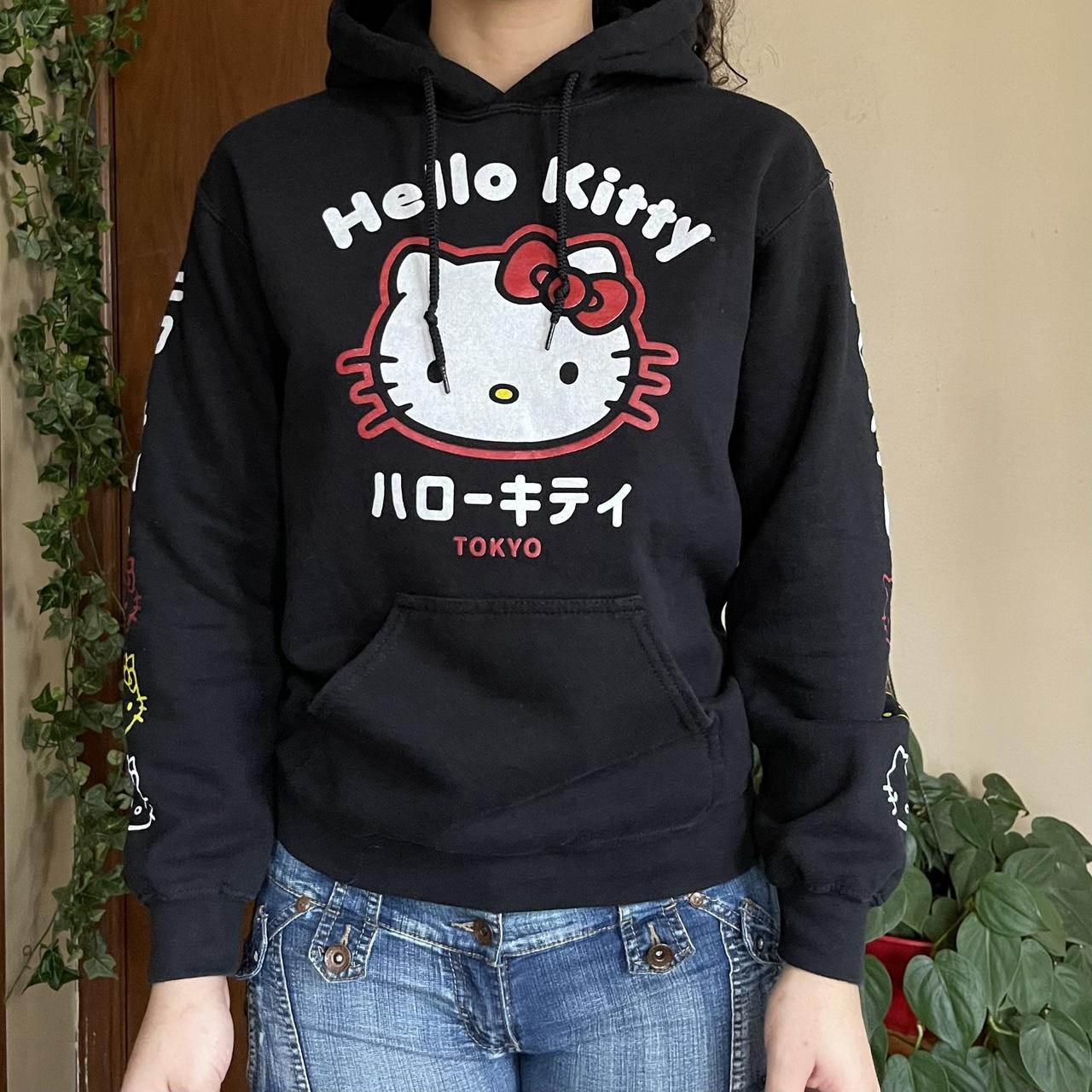 Trendy Hello kitty black hoodie, no size on tag fits... - Depop